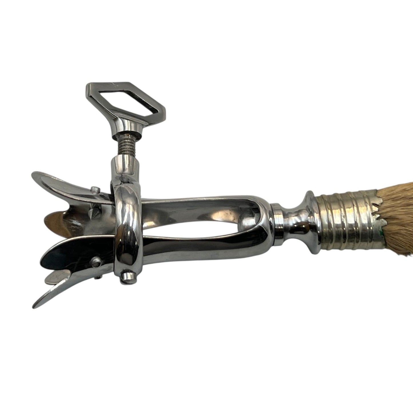 Traditional French vintage gigot with a deer hoof handle on a white background, ideal for a taxidermy collector 