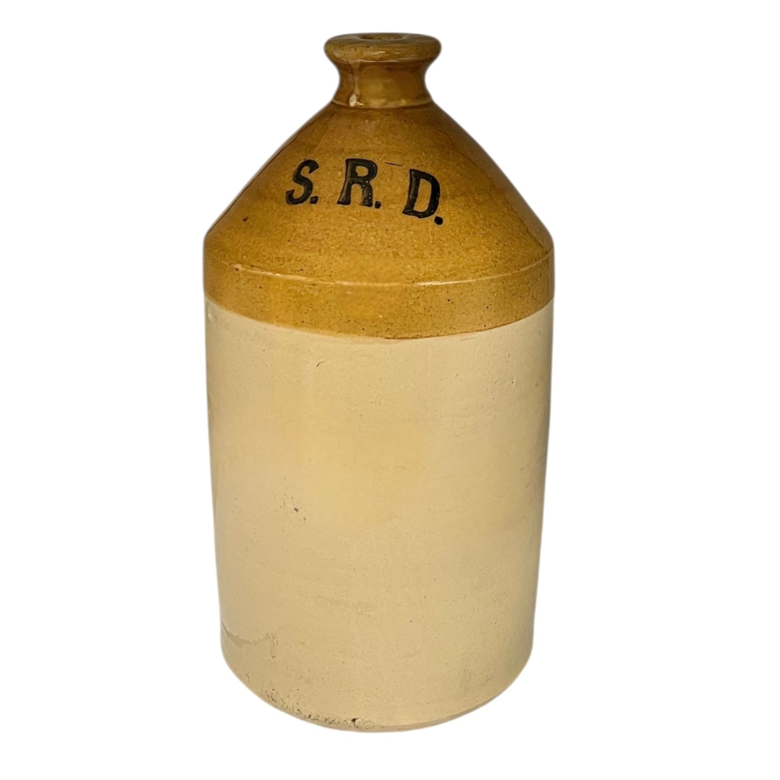 Beige ceramic WW1 militaria  jar with 'S.R.D.' inscription on a white background