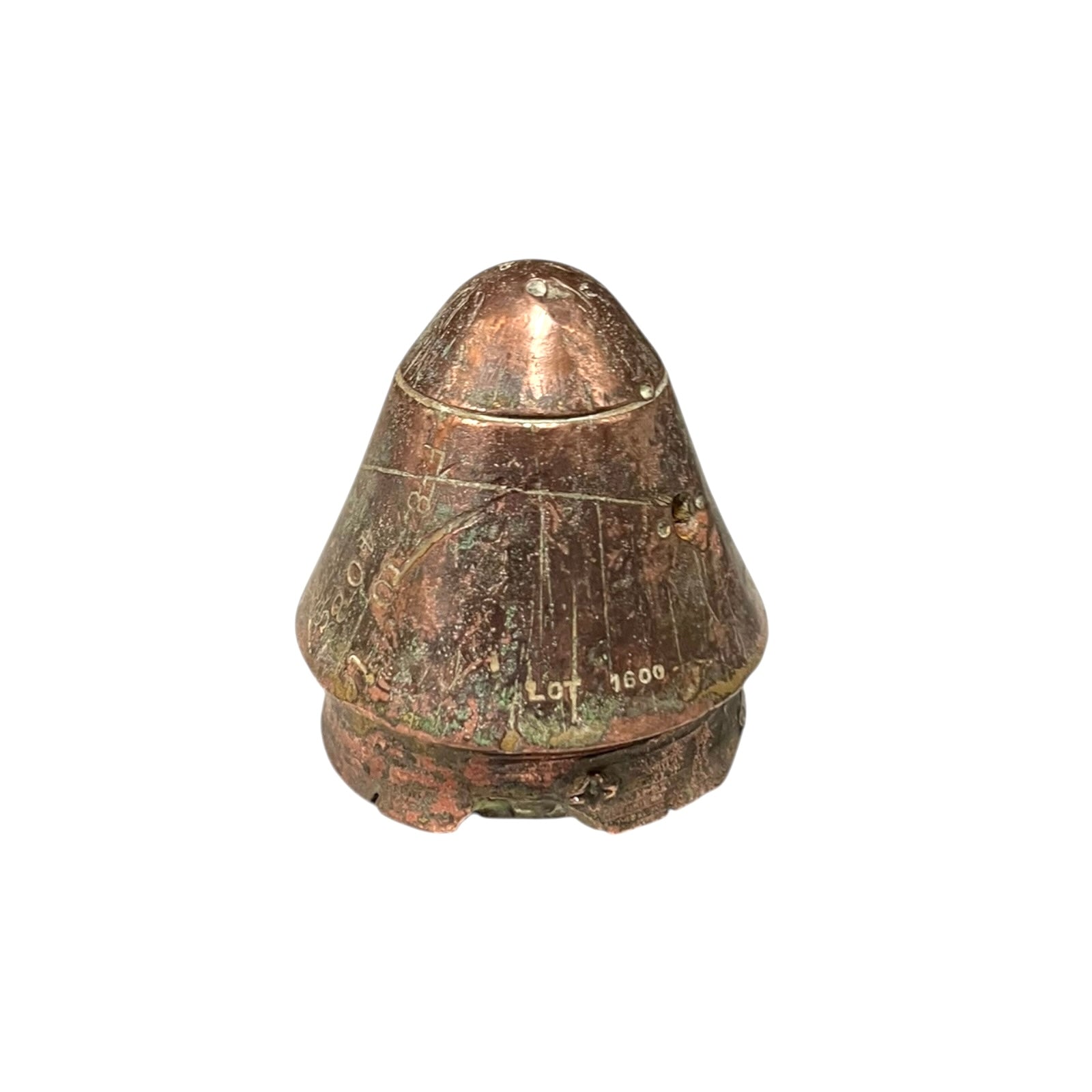 WW1 British brass fuse now repurposed as a paperweight on a white background