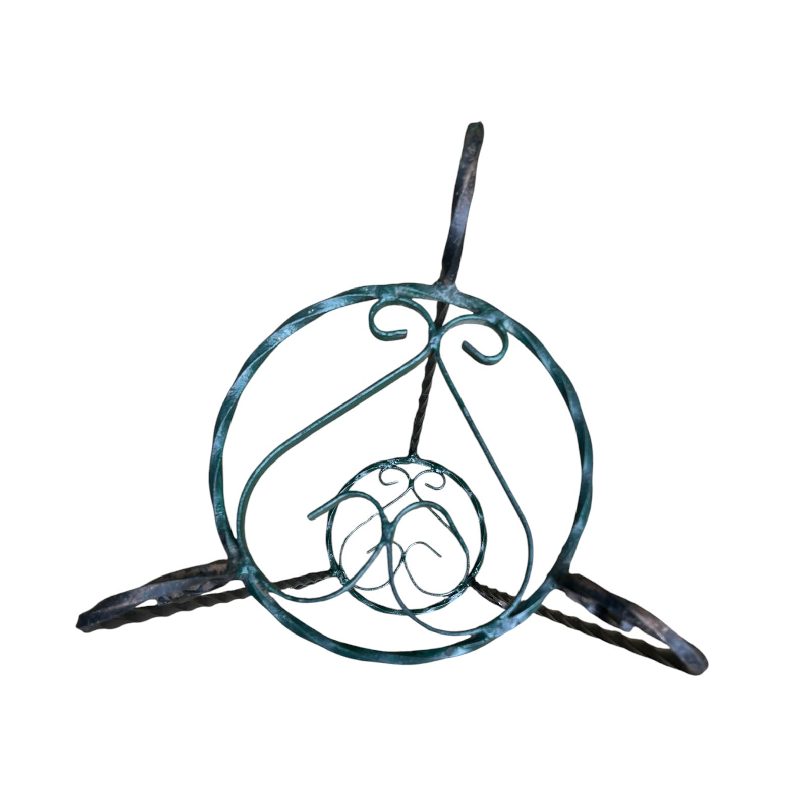 Green and black wrought iron jardinière scrolled plant stand on a white background