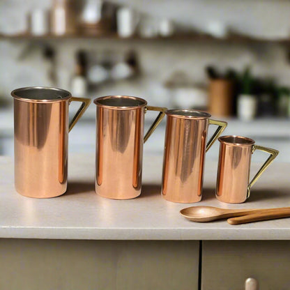 Set of 4 French Vintage Copper Kitchen or Bar Measures with brass handles for sale from All Things French Store