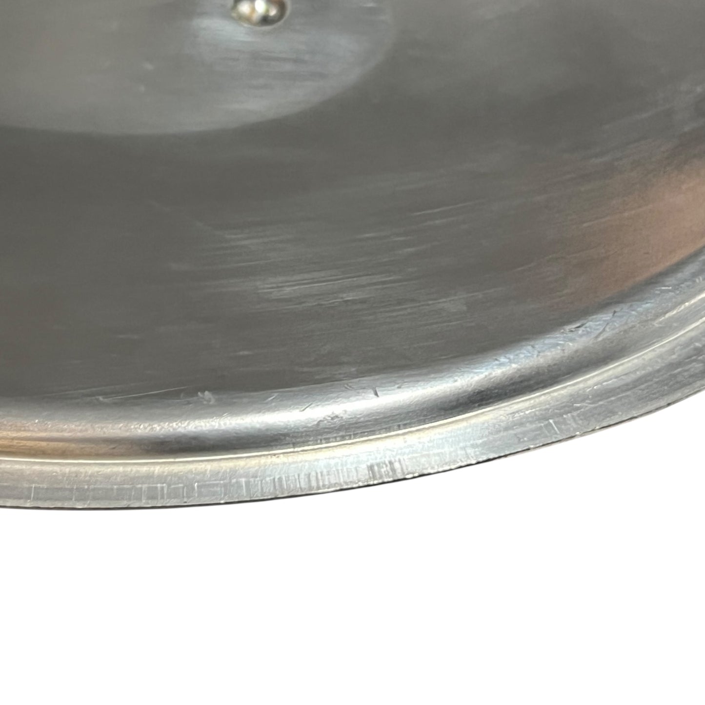 Close-up of the inner of a  copper pot handle on a white background