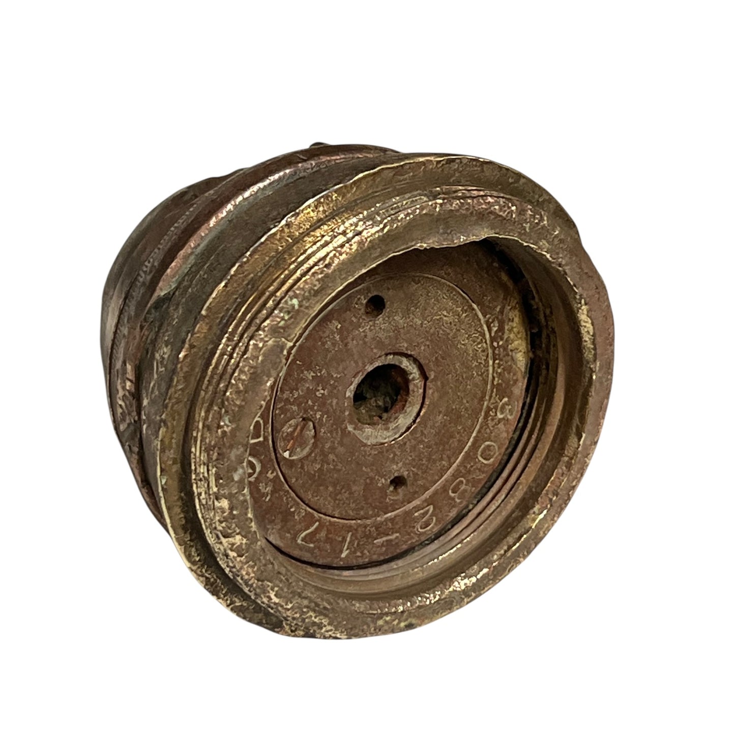 Close up of WW1 brass fuse on a white background