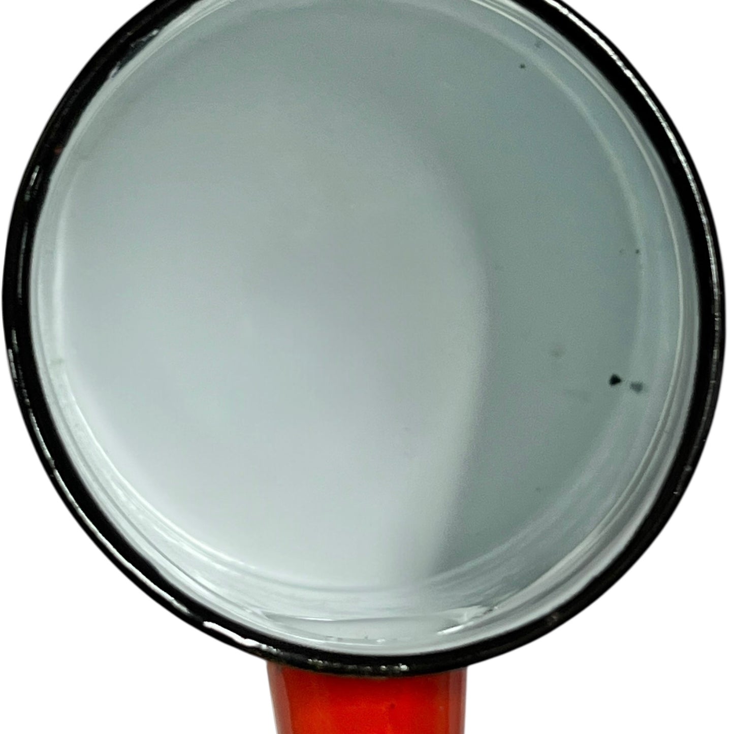 Close up of a red vintage French enamelled coffee pot on a white background