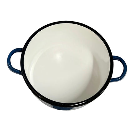A round enamel pot with a white interior, black rim, and dark blue handles, shown from a top-down view on a white background.