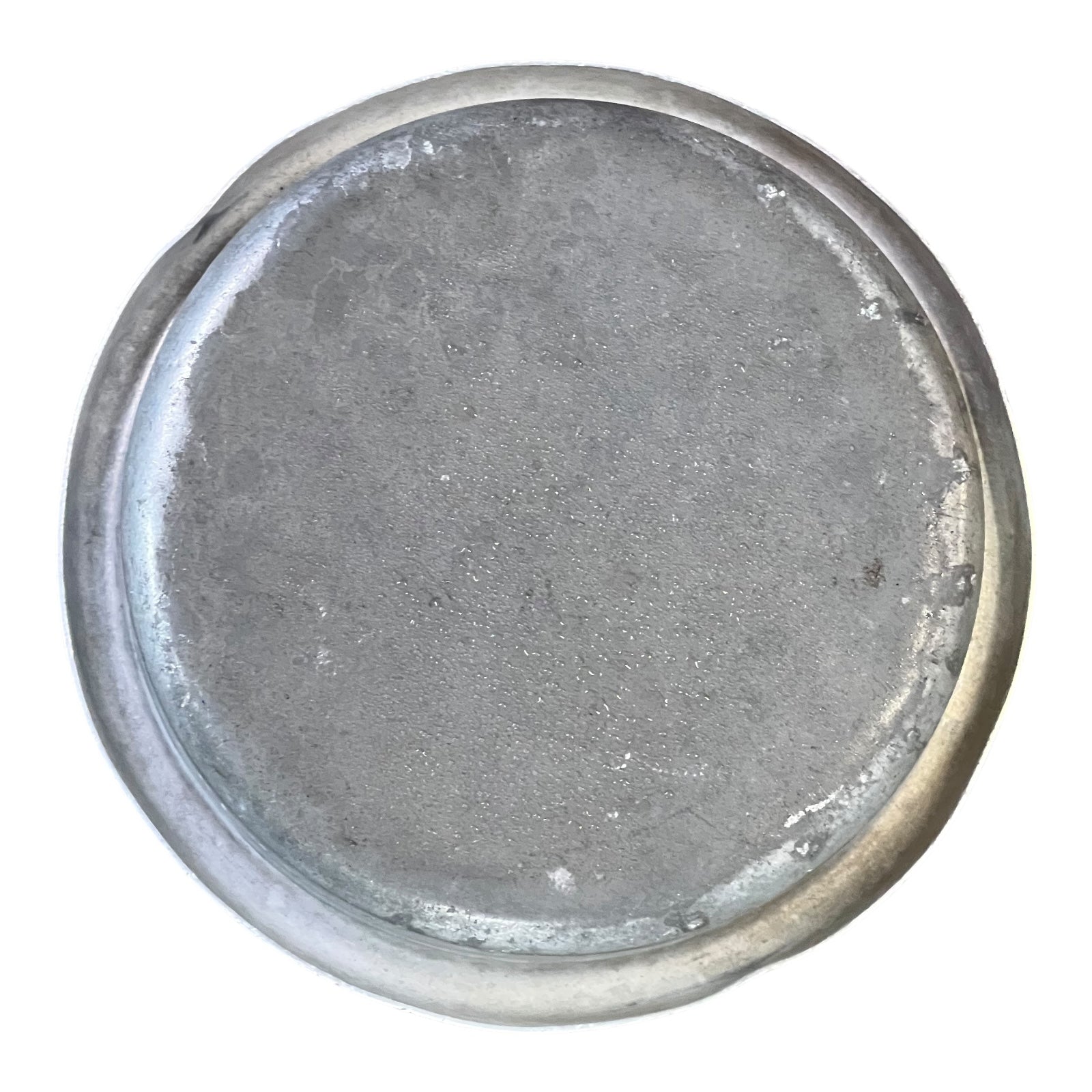 close up of metal milk churn on a white background