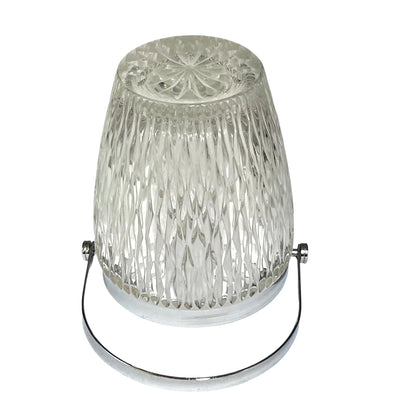 French vintage glass ice bucket with a silver coloured collar and a handle on a white background 
