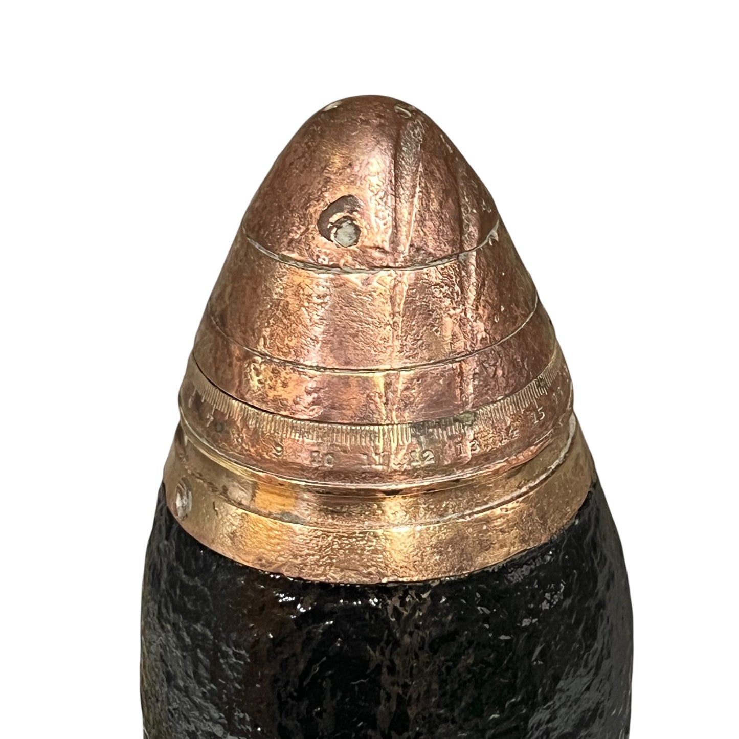 Brass fuse on a WW1 18 pounder on a white background 