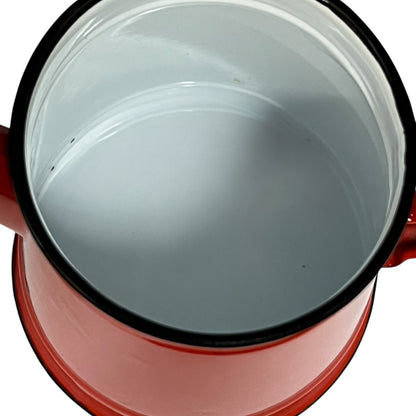 Close-up of a red teapot on a white background