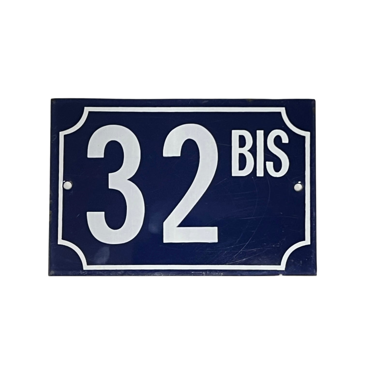 French rectangular vintage enamel door number sign 32 bis with white lettering on a blue background, for an authentic rustic French style front door, set on a white background 