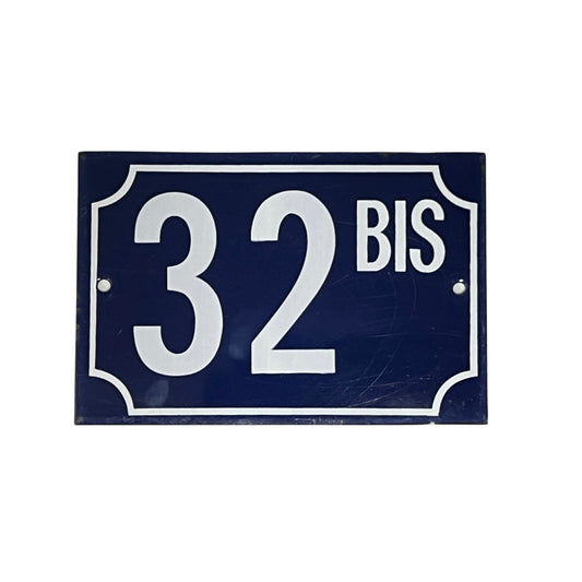 French rectangular vintage enamel door number sign 32 bis with white lettering on a blue background, for an authentic rustic French style front door, set on a white background 