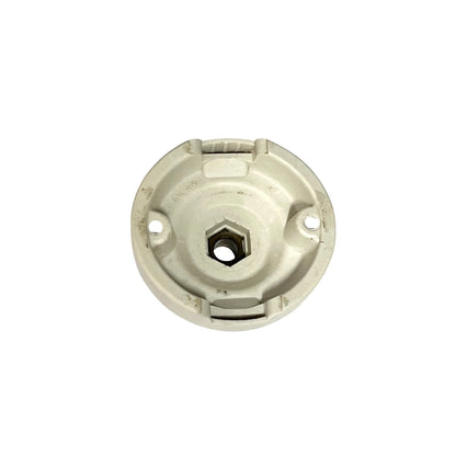 close up of the underside of a light fitting on a white background 