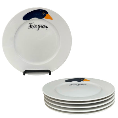 Set of white plates with duck design and 'Foie gras' text on a white background