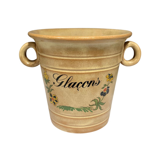 Ceramic ice bucket with 'Glaçons' text and floral designs on a white background