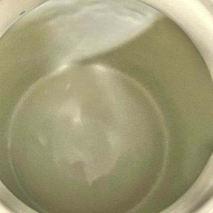 inside of a ceramic French table bin