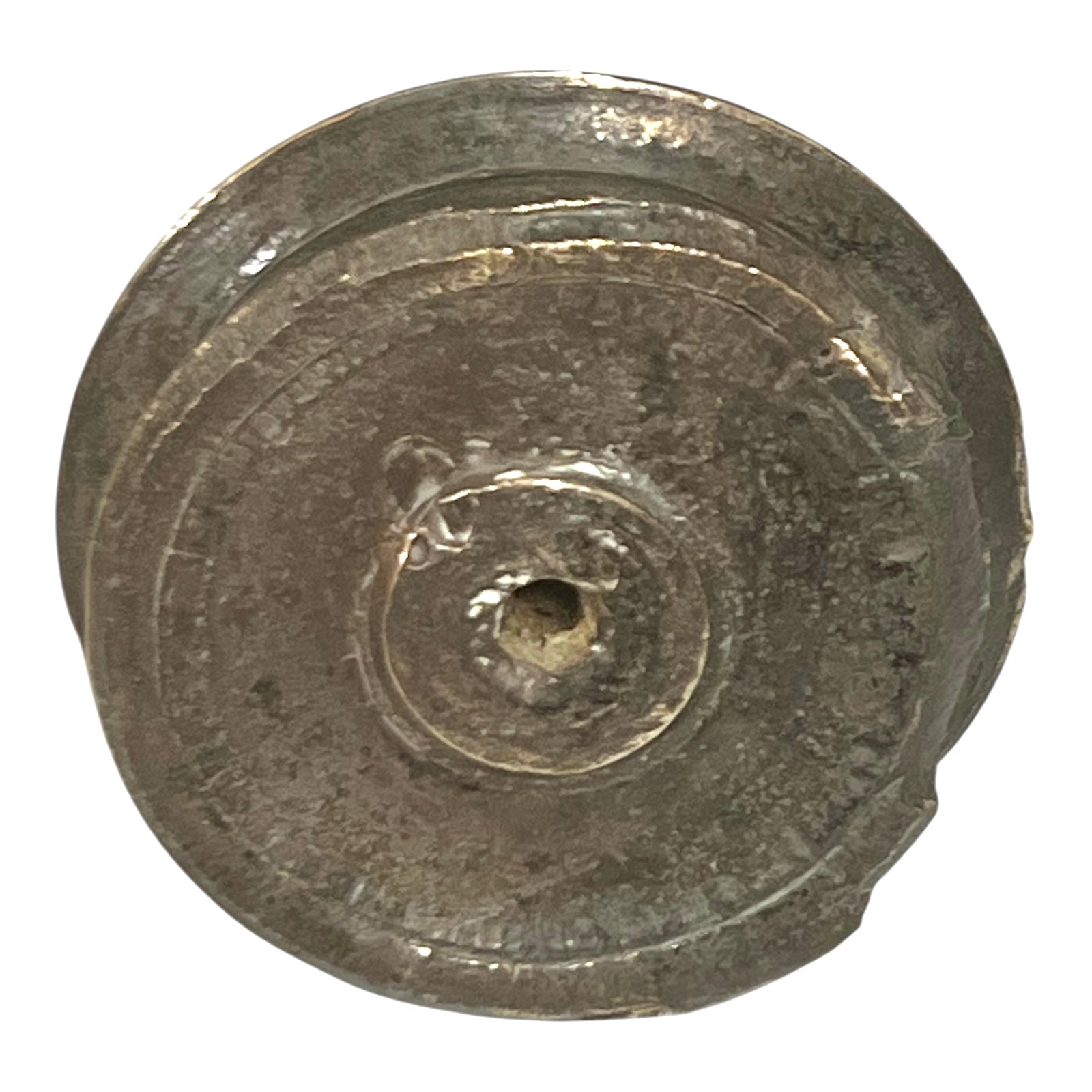 WW1 brass fuse paperweight on a white background