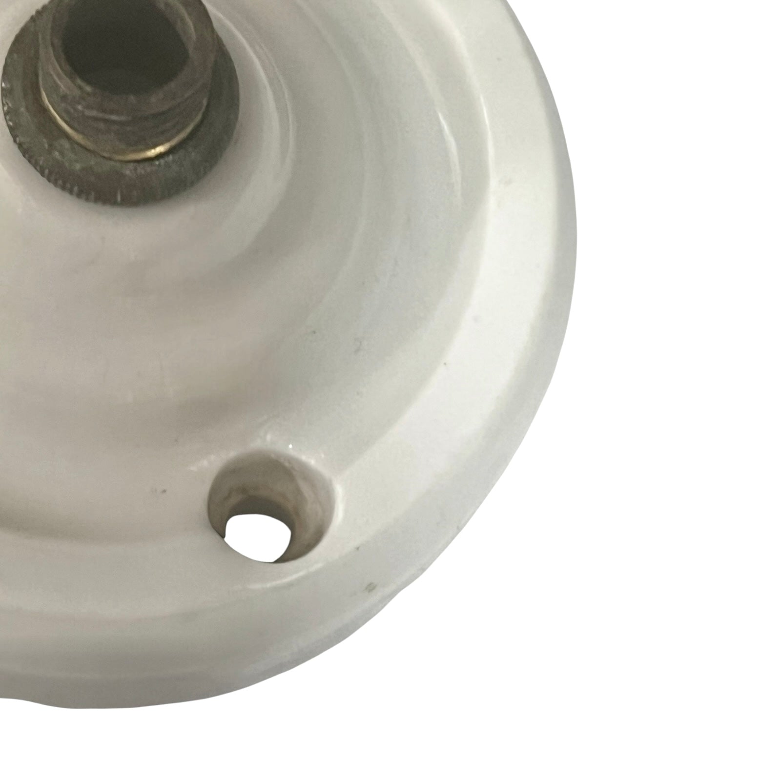 White French porcelain ceiling light rose fitting with a brass screw and 2 screw holes on a white background