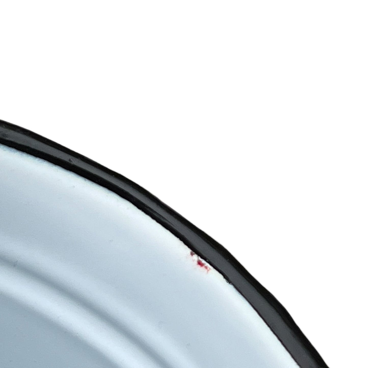 Close-up of a red teapot on a white background