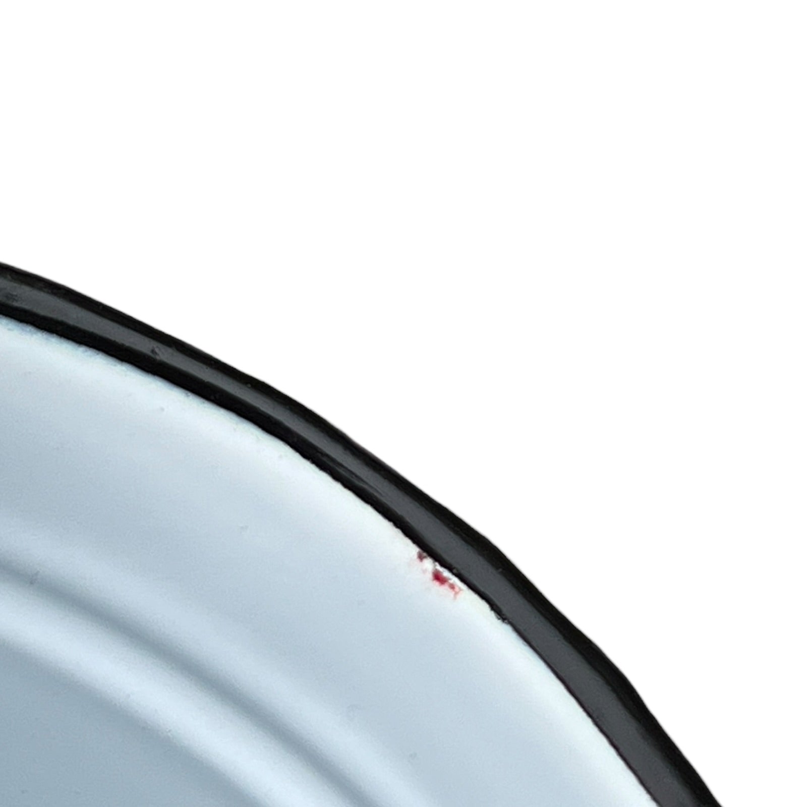 Close-up of a red teapot on a white background