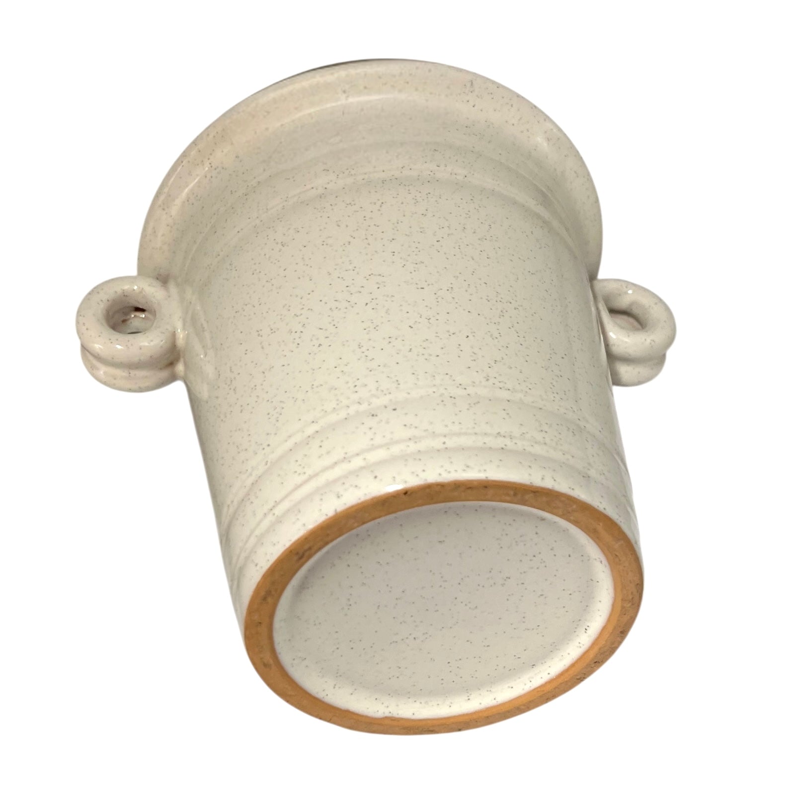Underside of ice bucket on a white background