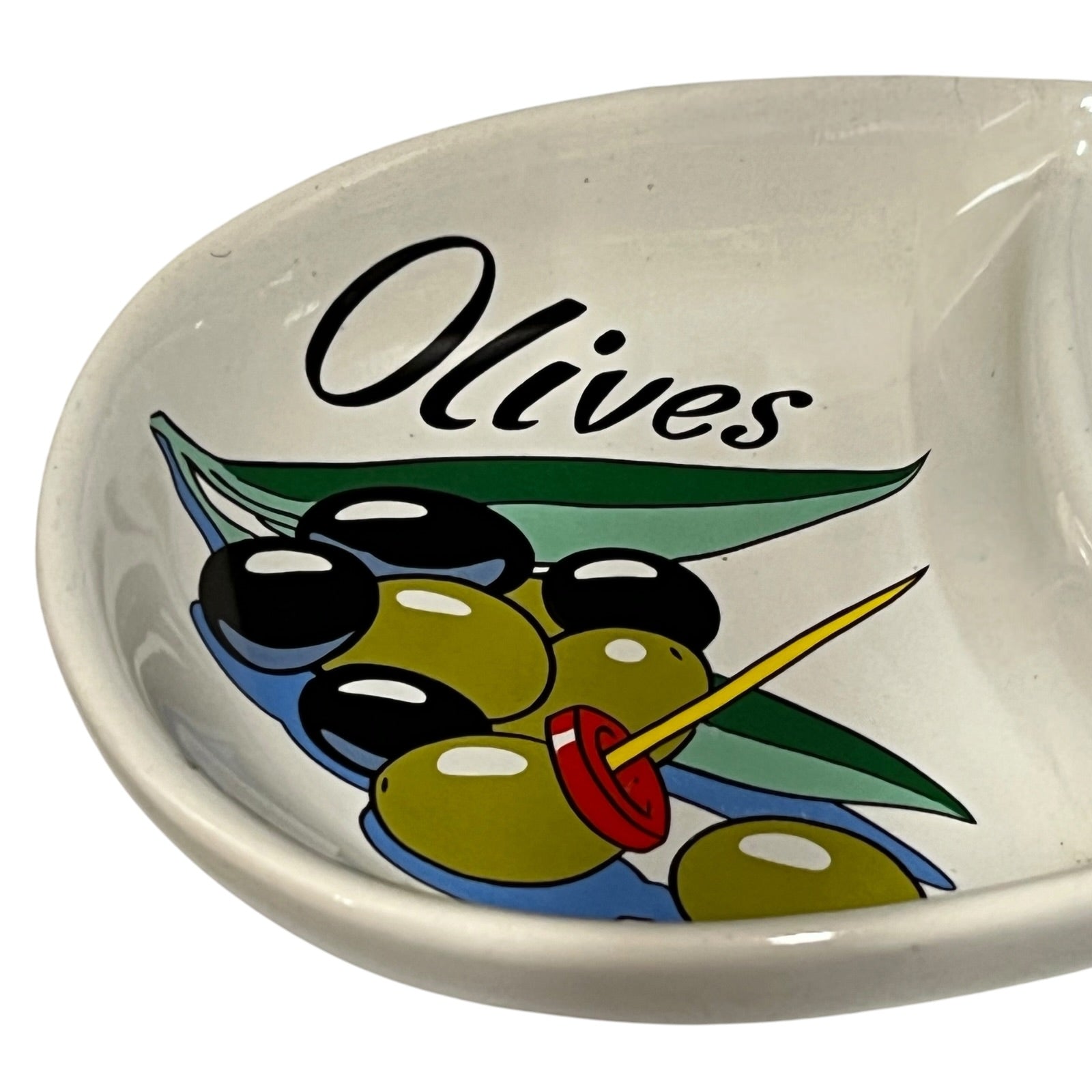 Ceramic dish with olive design and 'Olives' text on a white background