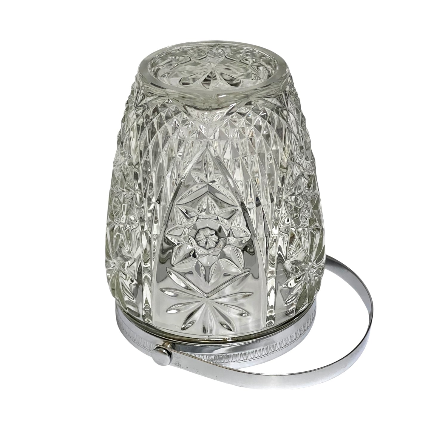 Decorative glass vintage ice bucket with metal collar and handle on a white background