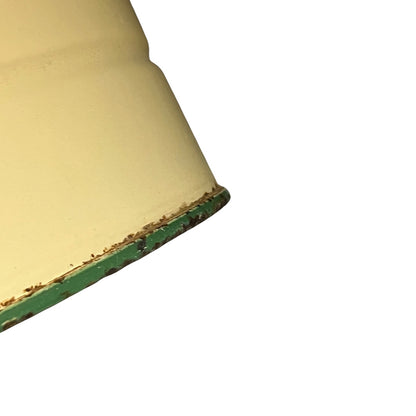 Close up of a French enamel bucket on a white background 