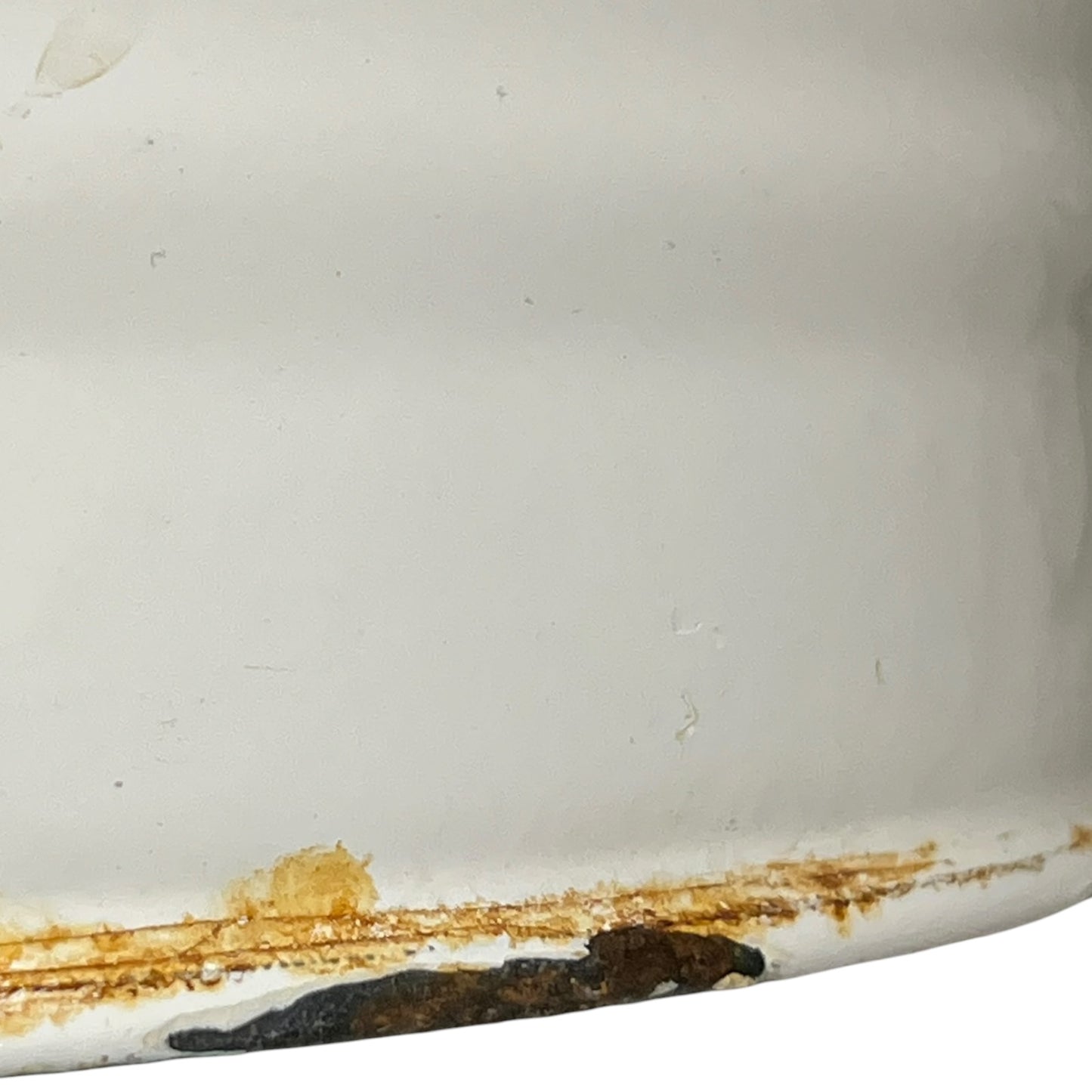 Close up of a vintage enamel lidded white bucket on a white background