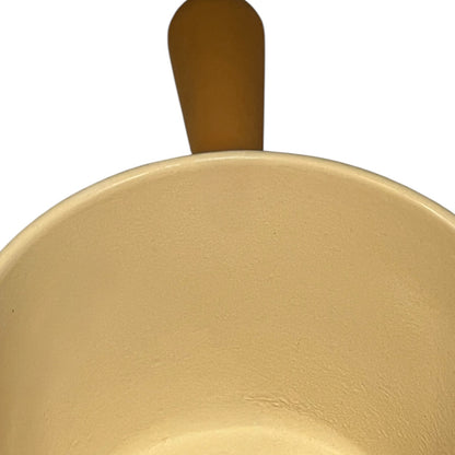 Close up of Le Creuset pan on a white background