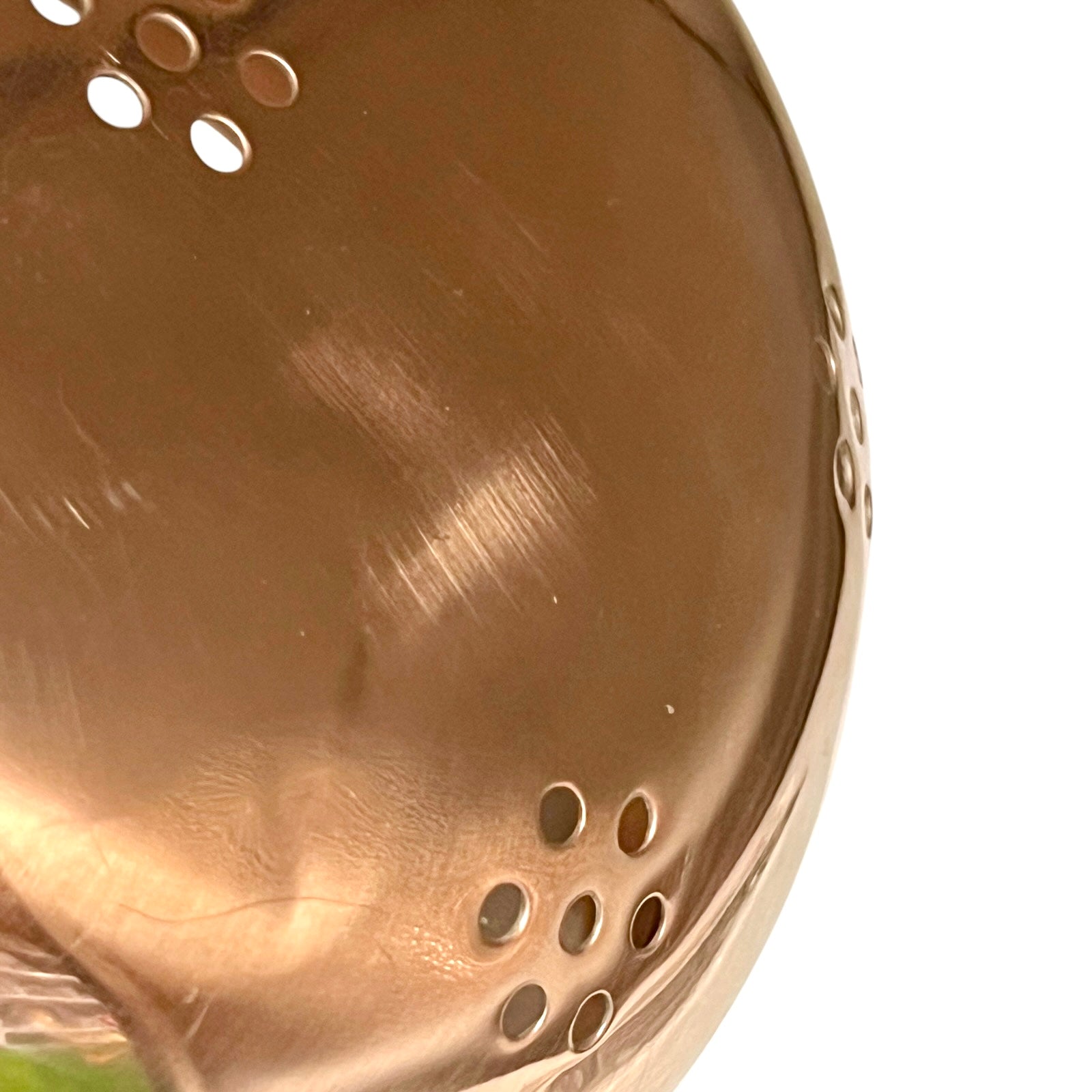 Copper colander close up