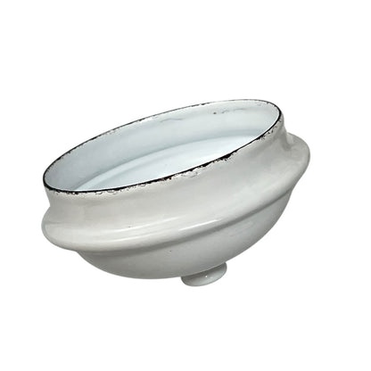 Close up of an enamel coffee pot on a white background