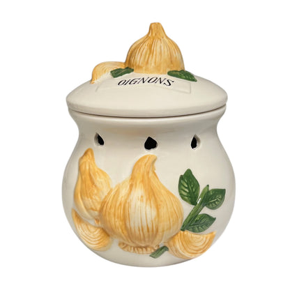 Ceramic onion jar with decorative lid on a white background