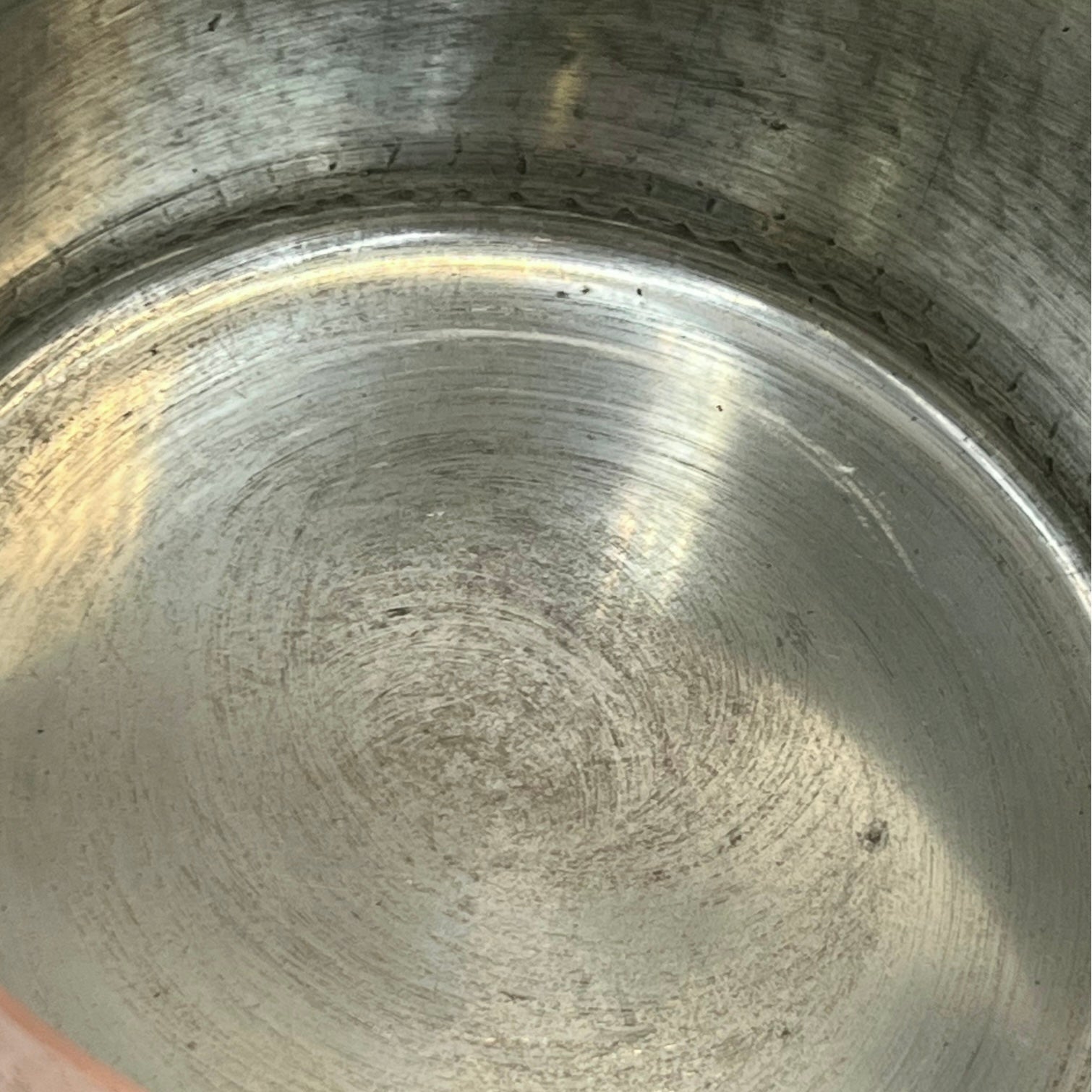close up of copper pan tin lined inner