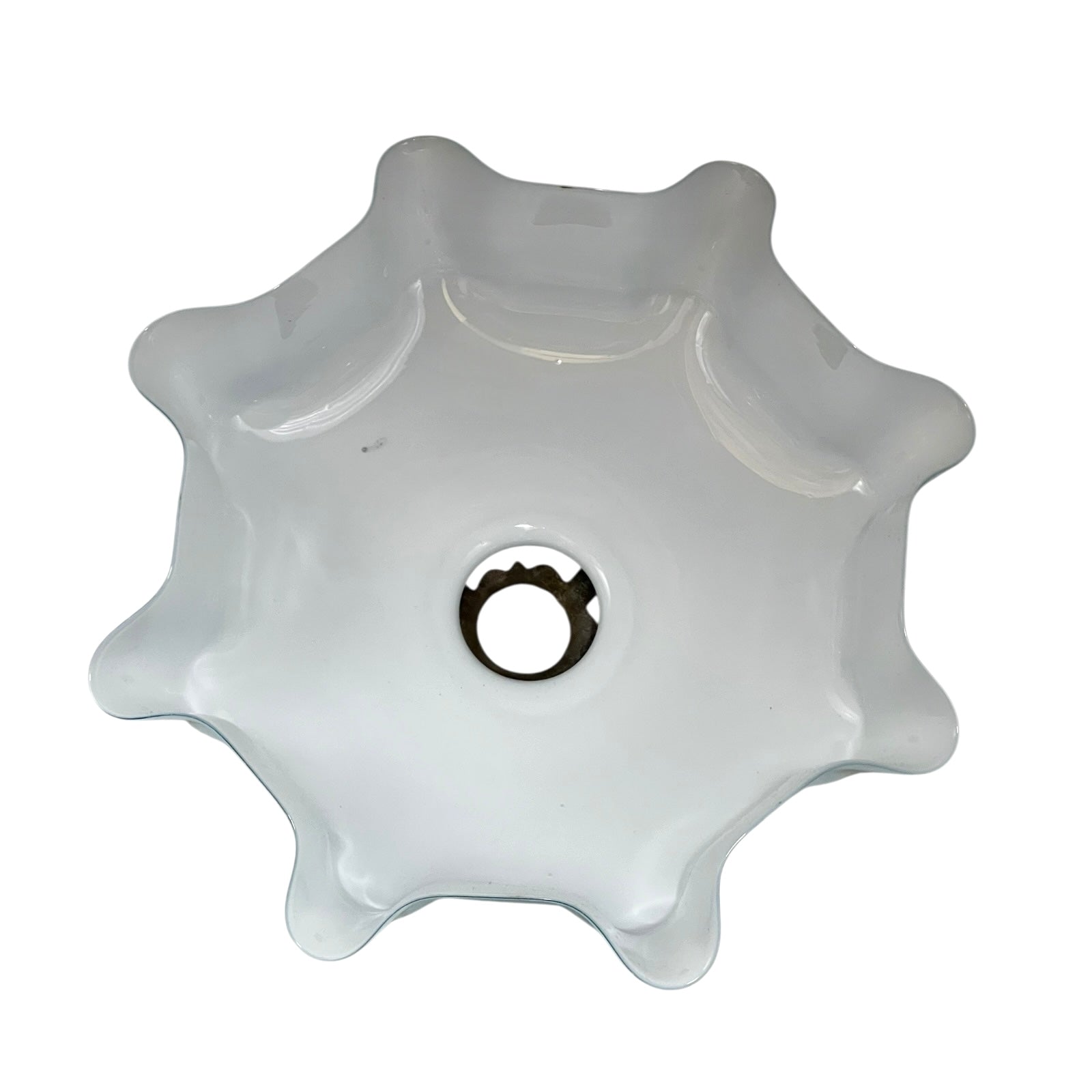 Close up of vintage blue glass lamp shade with brass fitting on a white background