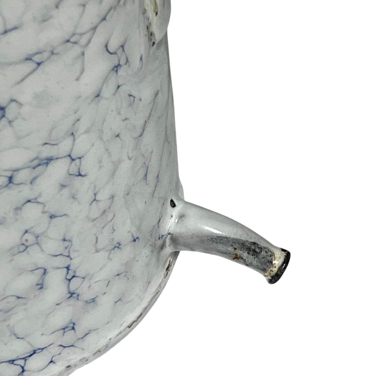 Close-up of a white enamel-covered metal container or pitcher with a blue marbled crackle pattern and a small side spout, shown on a plain white background.