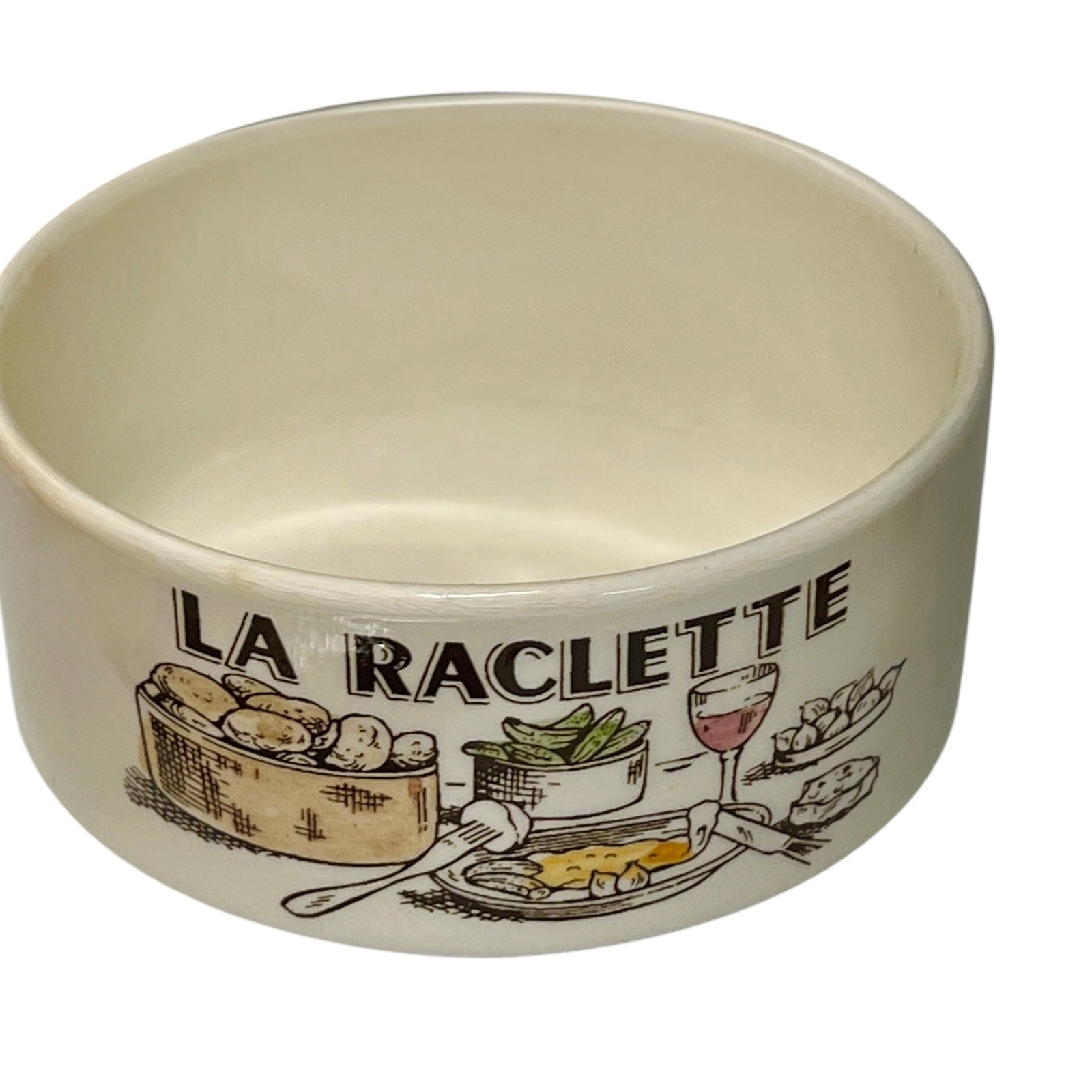 Ceramic bowl with 'La Raclette' design on a white background