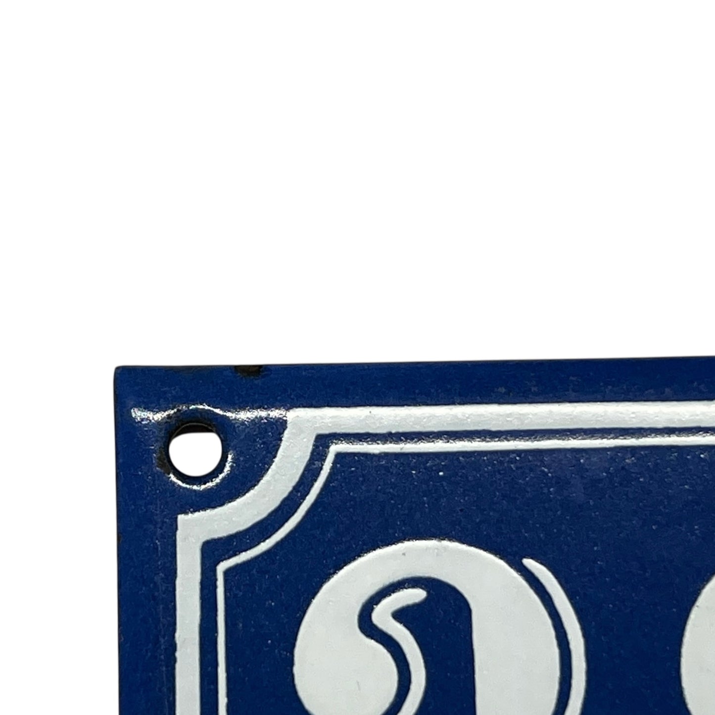 corner of enamel door number