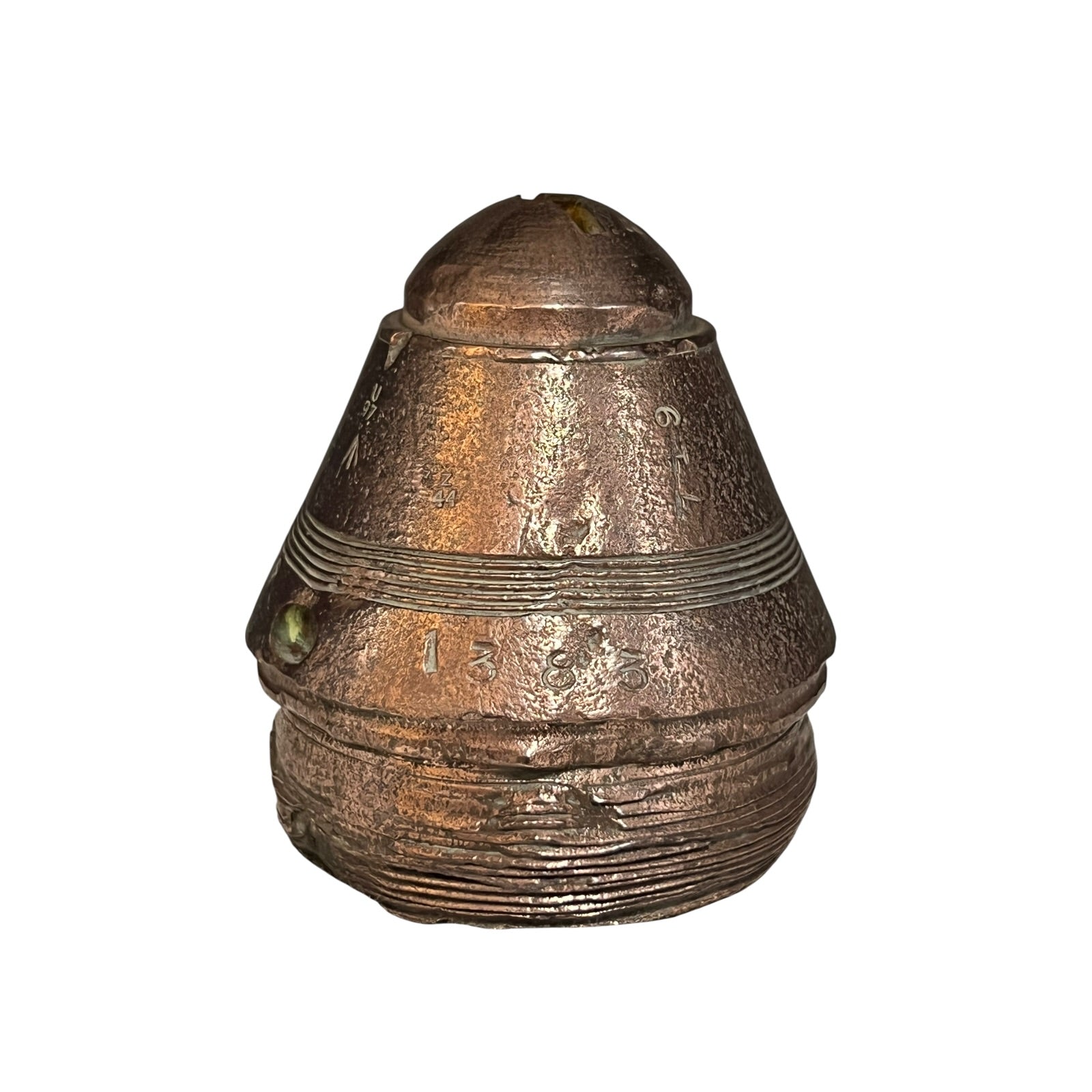 Brass metal cap fuse on a white background