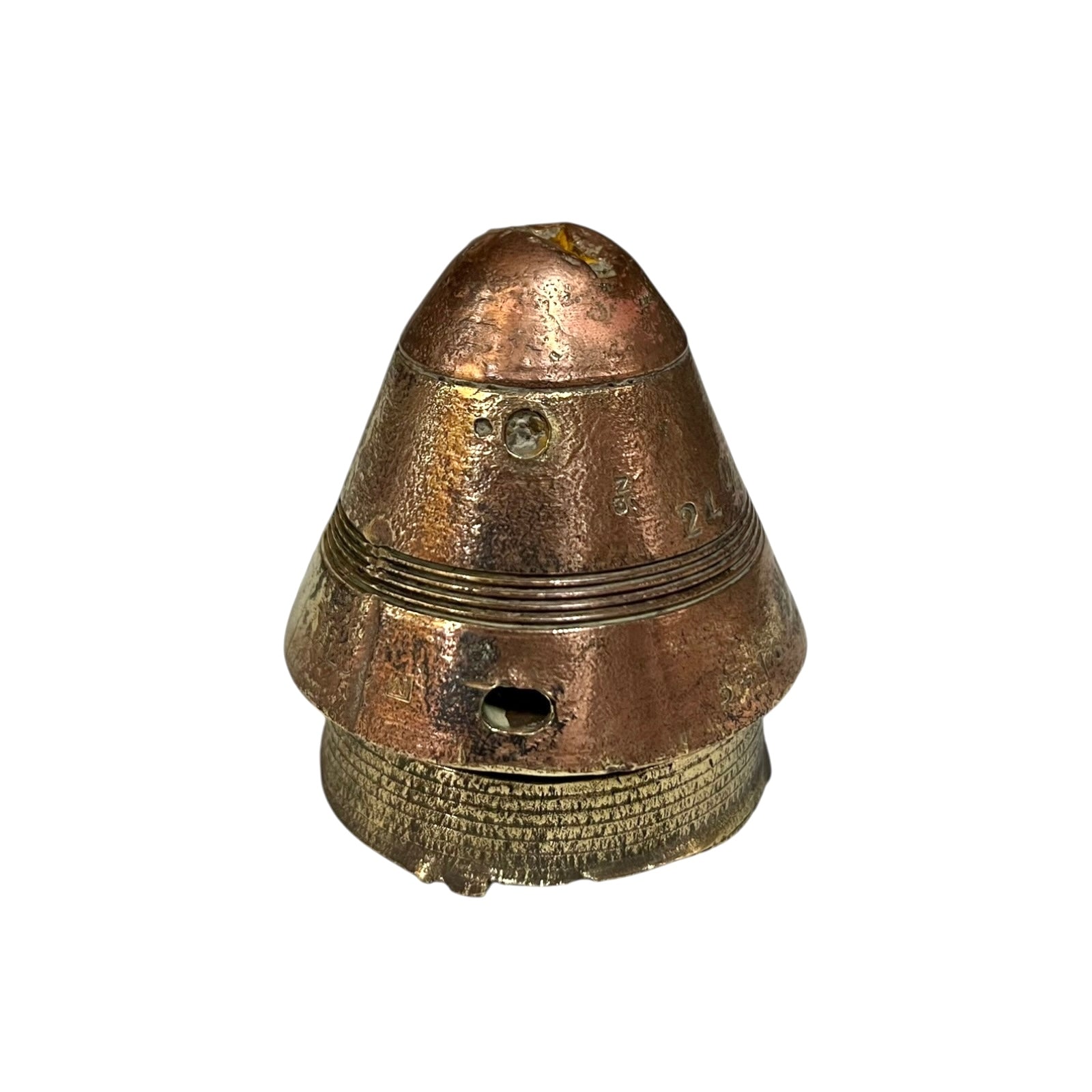 WW1 relic brass fuse number 102, ideal as a paperweight n a white background