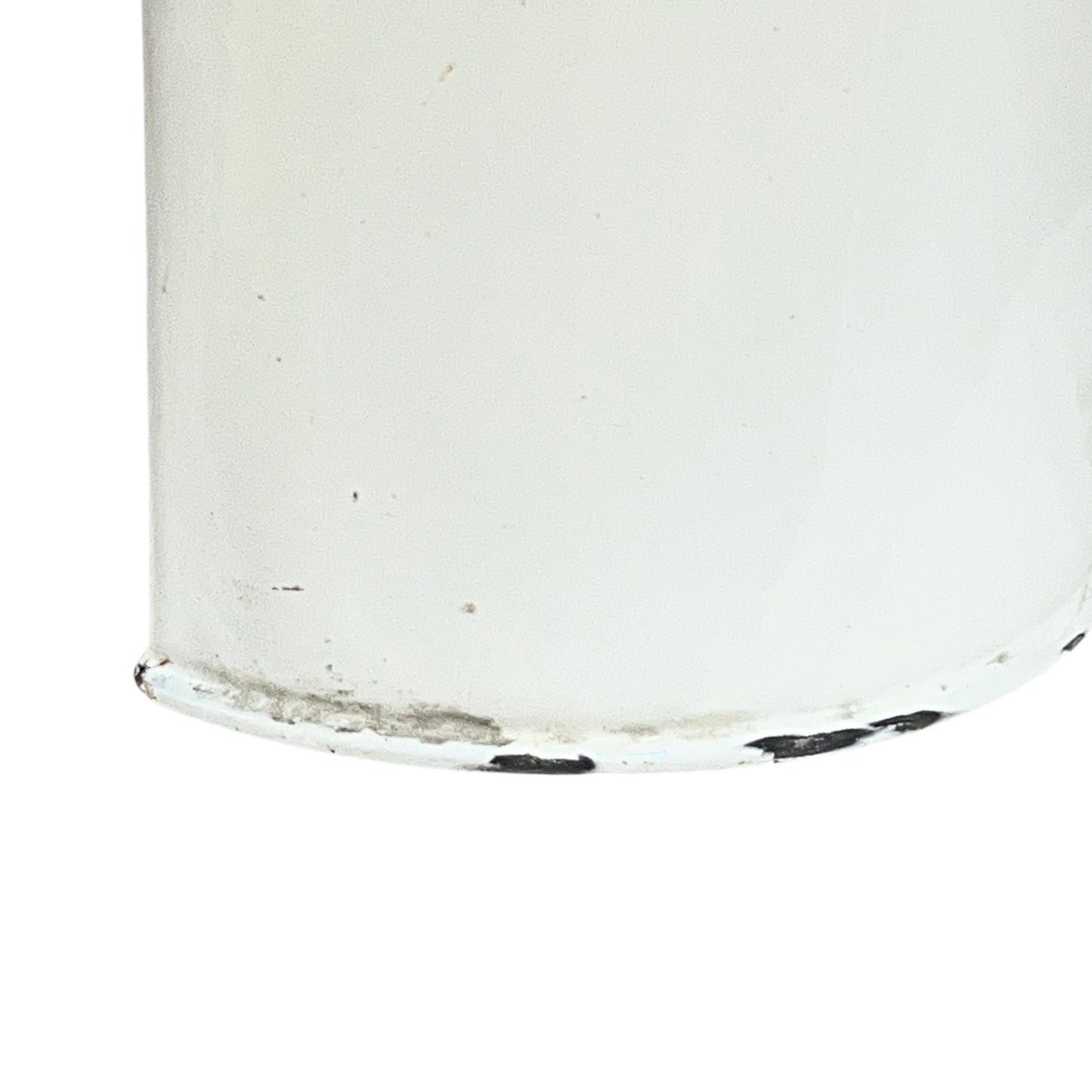 Close up of  French vintage enamel planter with a flat back and a spout on a white background