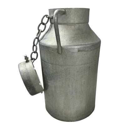 Metal milk can with a lid on a chain on a white background