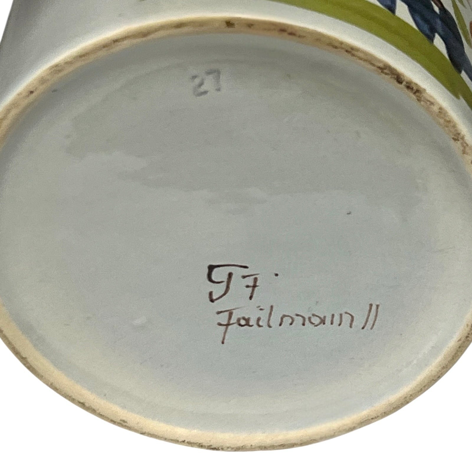 Ceramic jar with a signature on the base