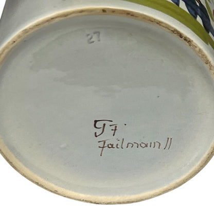 Ceramic jar with a signature on the base