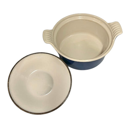 Blue ceramic cast iron casserole dish  on a white background