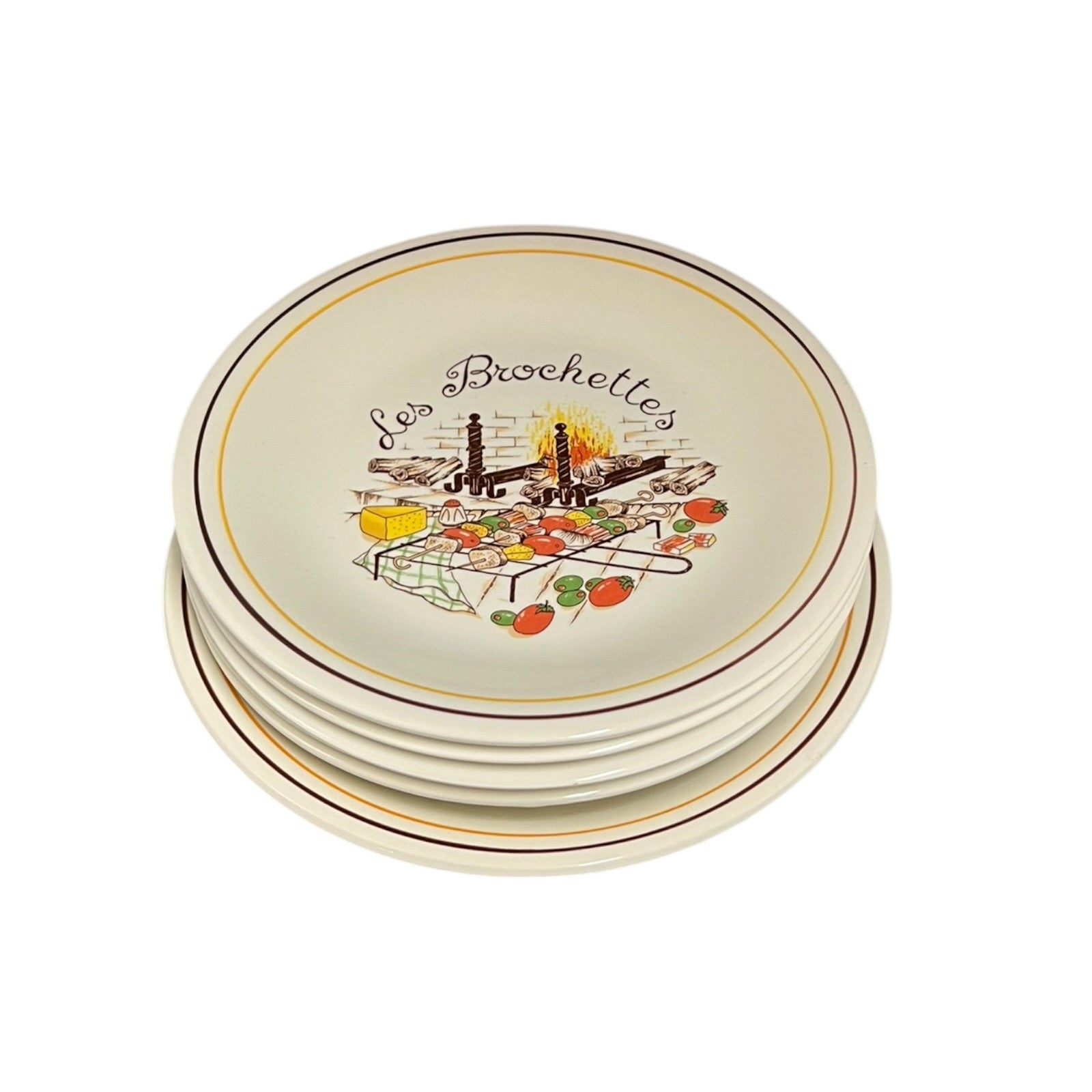 Set of round ceramic plates with decorative design and 'Les Brochettes' text on a white background