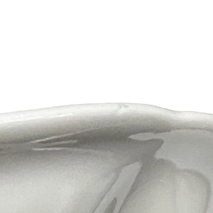 close up of asparagus serving set on a white background 