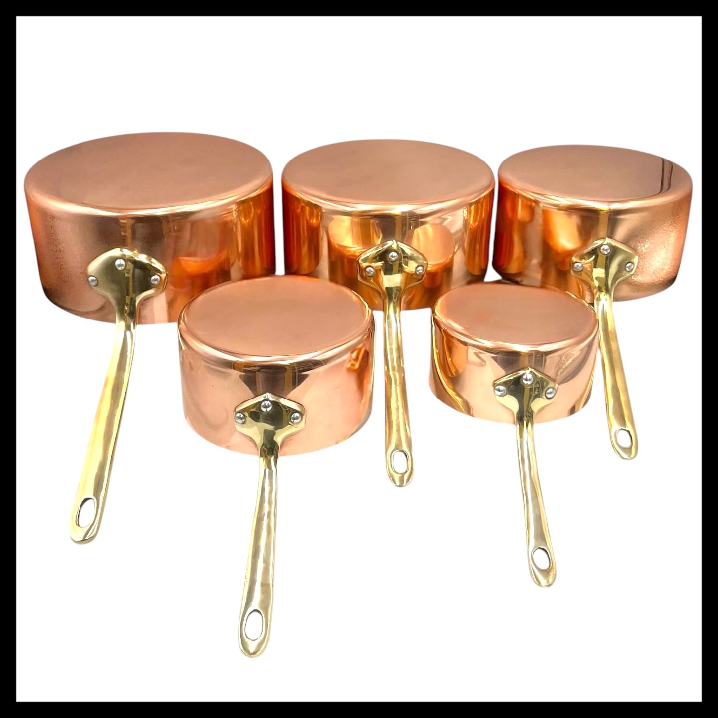 Set of 5 French copper saucepans with brass handles by Harvard 