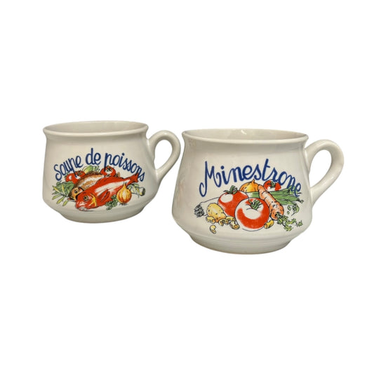 Two ceramic mugs with soup illustrations and text on a white background