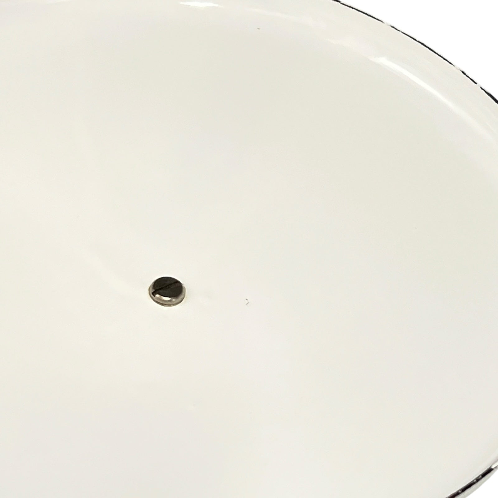 close up of White enamel saucepan lid inside on a white background