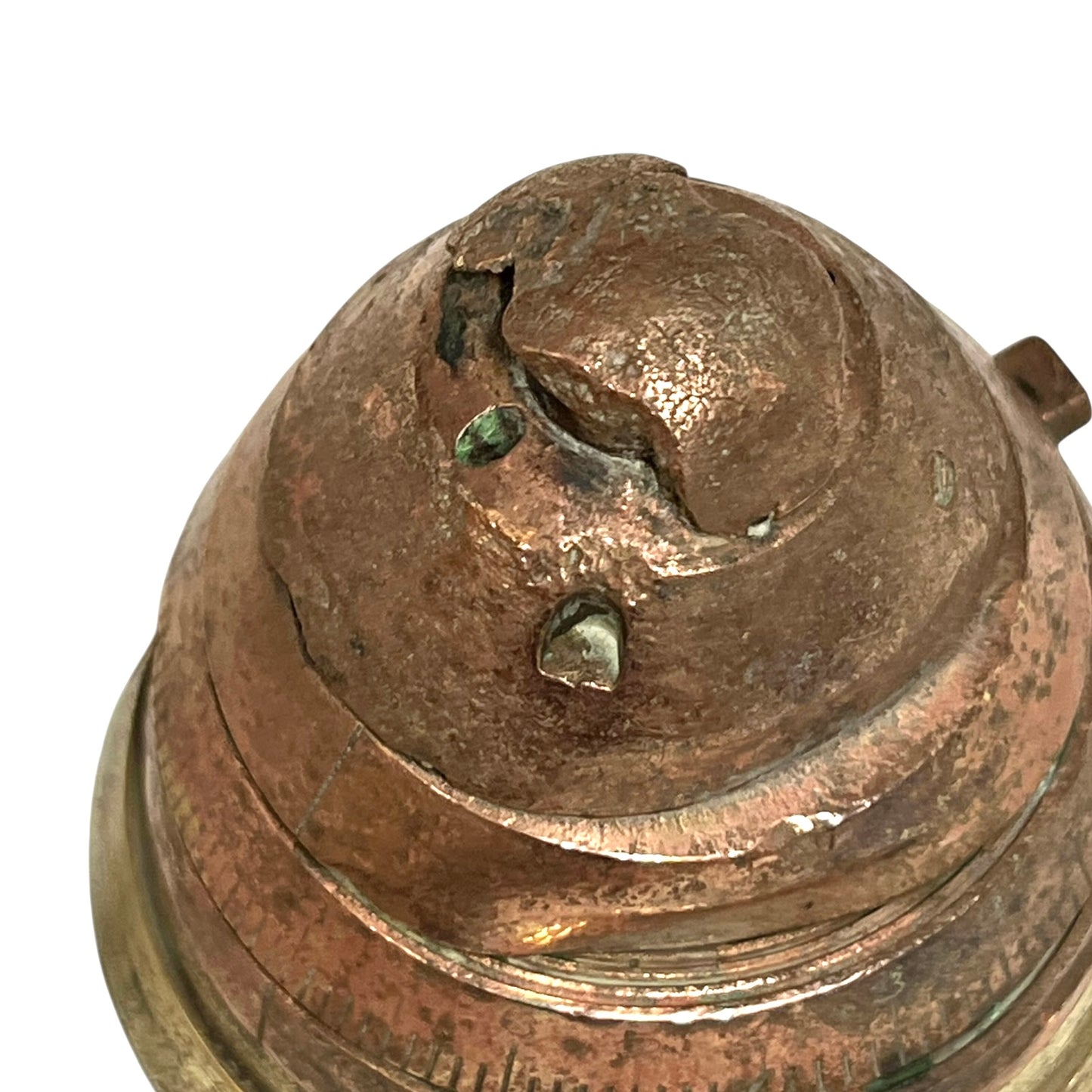 WW1 brass fuse paperweight on a white background